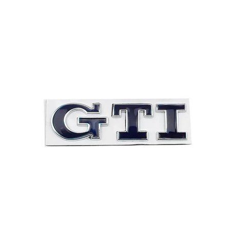 Емблема напис GTI для Volkswagen синя з сріблястою окантовкою 79х23 мм метал (на скотчі) 183943 фото