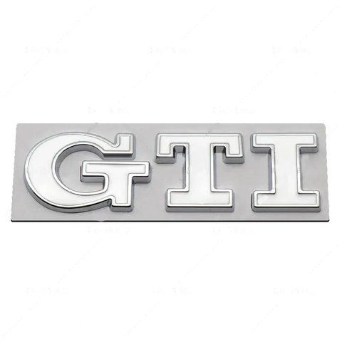 Емблема напис GTI для Volkswagen біла з сріблястою окантовкою 79х23 мм метал (на скотчі) 183945 фото