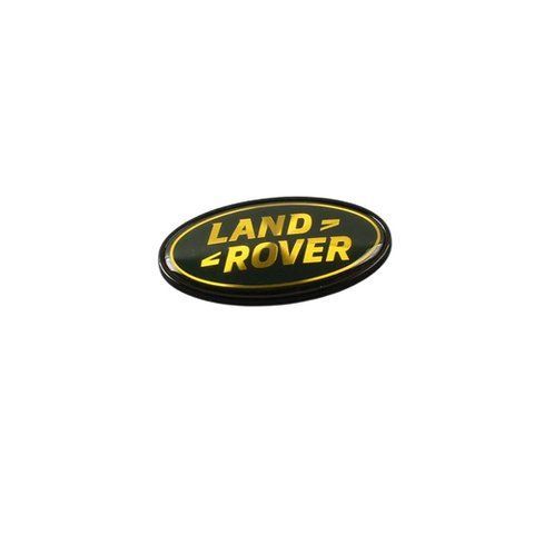 Емблема задня LAND ROVER хакі+золотий напис з чорним ободом 91х50 мм метал (на скотчі) DAH100680 184858 фото