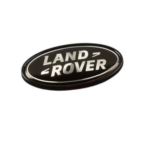 Емблема задня LAND ROVER чорний+білий напис з чорним ободом 91х50 мм метал (на скотчі) DAH500330 184861 фото