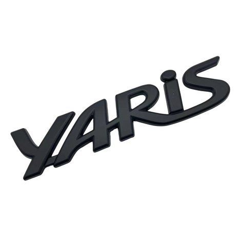 Эмблема надпись YARIS для Toyota черная 135х30мм металл (на скотче) 181794 фото