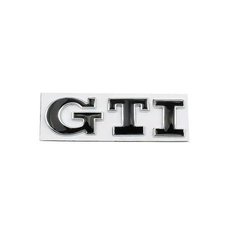 Емблема напис GTI для Volkswagen чорна з сріблястою окантовкою 79х23 мм метал (на скотчі) 183937 фото